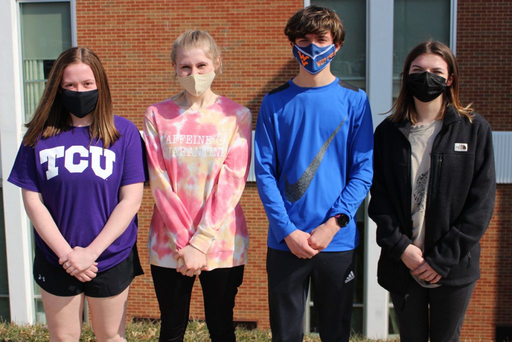 Pictured from left are the JM LifeSmarts team members: Miranda Taylor, Shelby Moore, MacK Allen and Alyssia Brannan. The team is standing in front of the school.