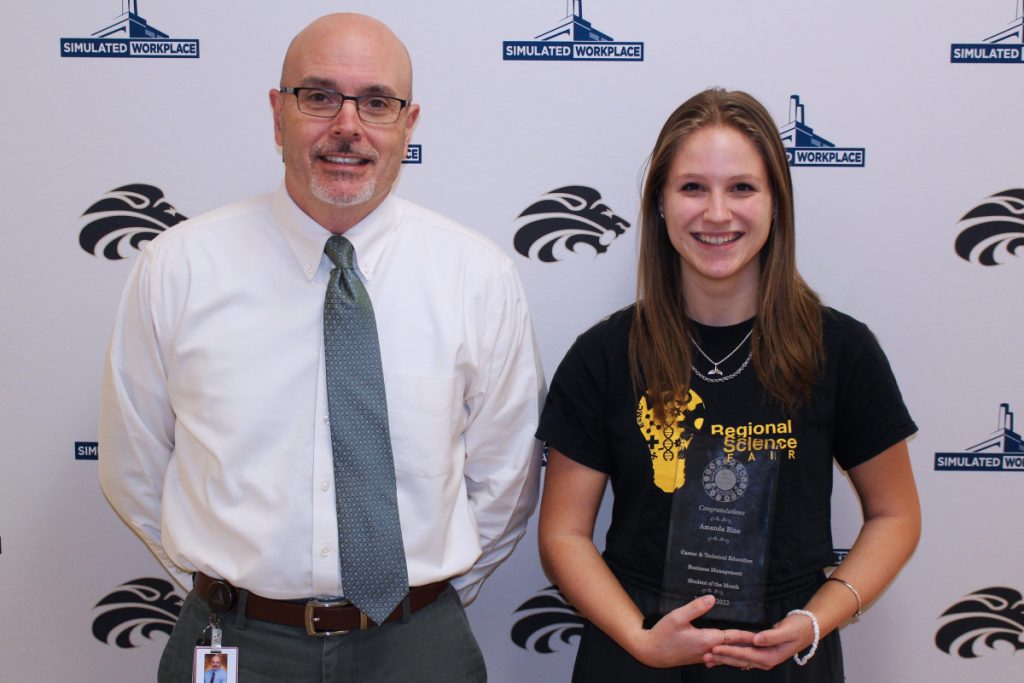 Pictured from left: Management teacher Joe Kuskey and CTE Student of the Month Amanda Rine.