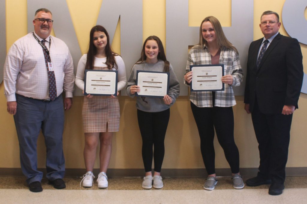 Pictured from left: JM Assistant Principal Geno Polsinelli, Sophia Crumm, Karleigh Stricklin, Gracie Whitlatch and and K of C Council 1907 Grand Knight Lou Richmond.