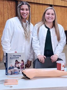 Pictured from left: Monarch Medical students Mackenzie Lagos and Anna Rose, who also serves as the HOSA President, invite everyone who is eligible to roll up their sleeves to donate blood this coming Monday at JMHS.