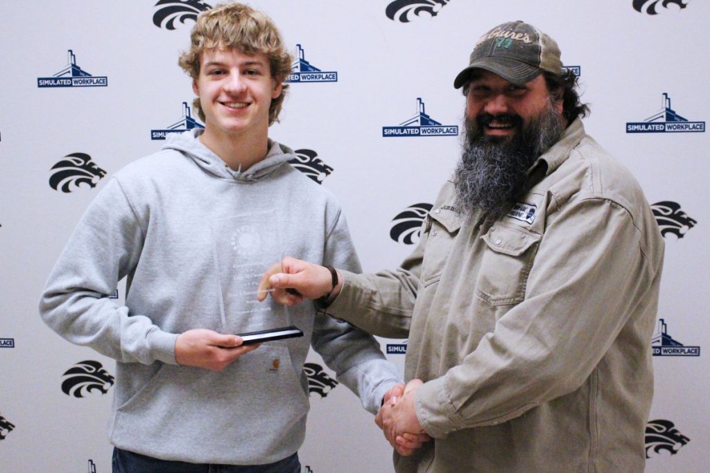 Pictured from left: and CTE Student of the Month Luke McCauley and Welding Technology teacher Jayson Summers.