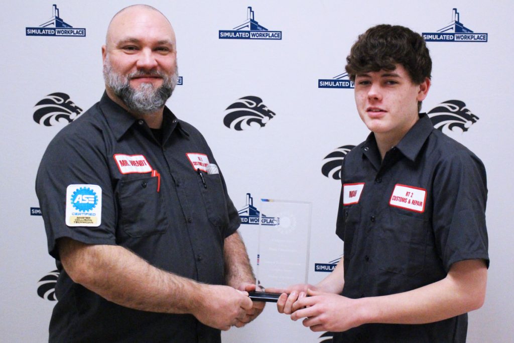 Pictured from left: Collison Repair teacher Joe Wendt and CTE Student of the Month Noah Courtwright.