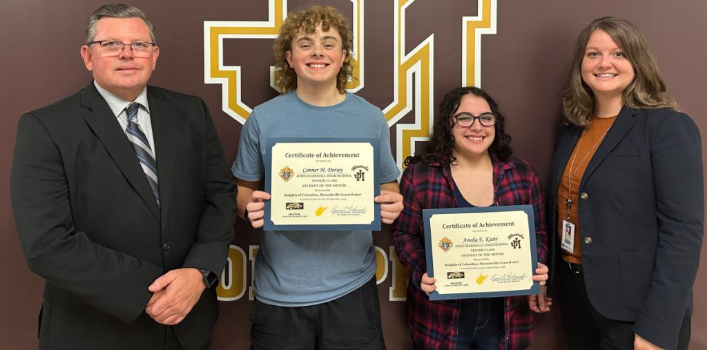 Pictured from left: K of C Council 1907 Grand Knight Lou Richmond Lou Richmond, Connor Dorsey, Amelia Kaste and JM Assistant Principal Kallie Kastrevec.