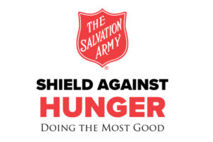 Salvation Army logo with Shield Against Hunger Doing the Most written in black and red.