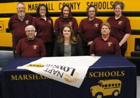 Pictured seated: Dr. Shelby Haines is flanked by MCS Safety Team members Douglas Brown and Dee Gamble. Back row from left are MCS Safety Team members: Kenny Richmond, Paula Carmichael, Kayla Kidd, Nadine McCardle and Ashley Becker.