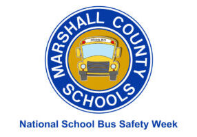 Marshall County Schools blue logo with a school bus in the middle of the circle.